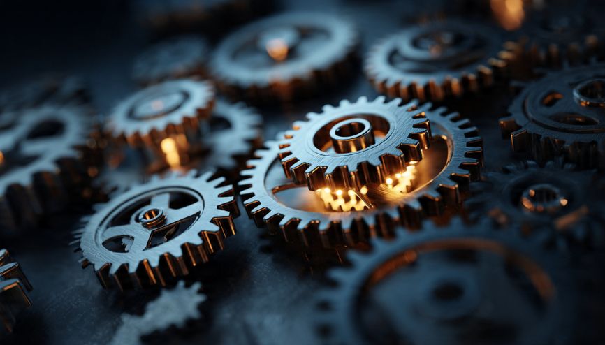 Diferentes tipos de Automação empresarial representados por engrenagens interconectadas.